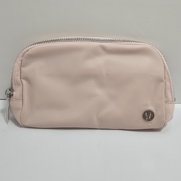 lululemon athletica Handbags - NWT Lululemon Everywhere Belt Bag 1L Wordmark Pink Silver EBB